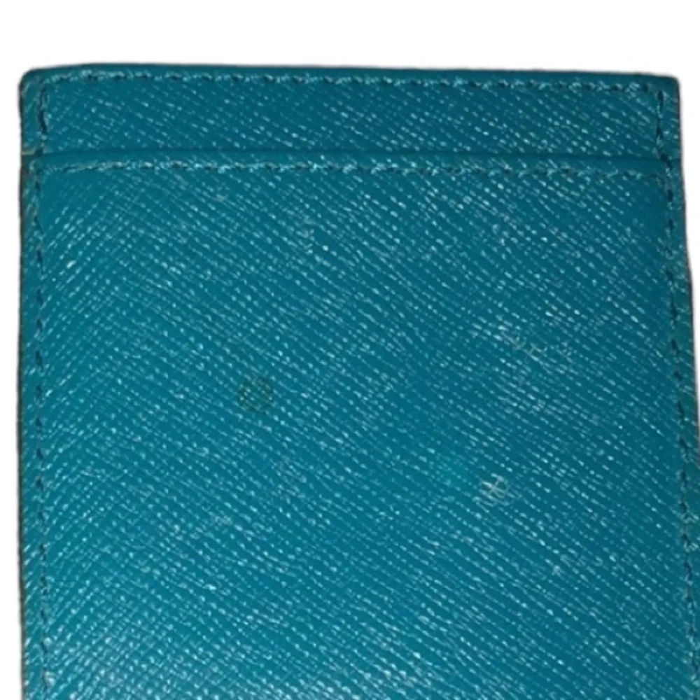 Micheal Kors  aqua blue wristlet ID card case like new